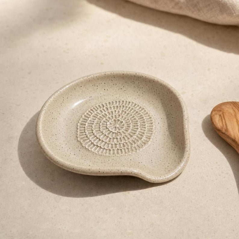 Oatmeal ceramic spoon rest and garlic grater